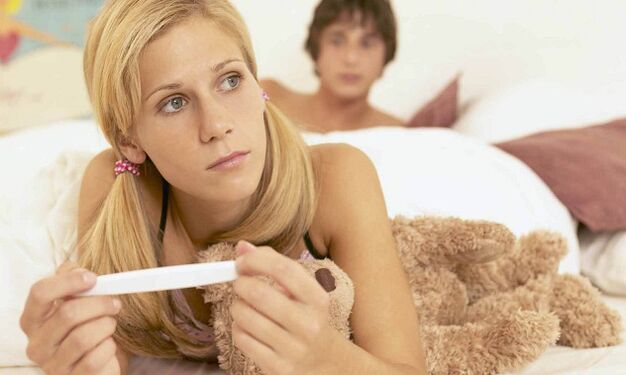 Girl with a pregnancy test